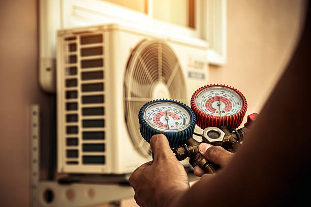 Professional Hvac technician working in Wellington, MO